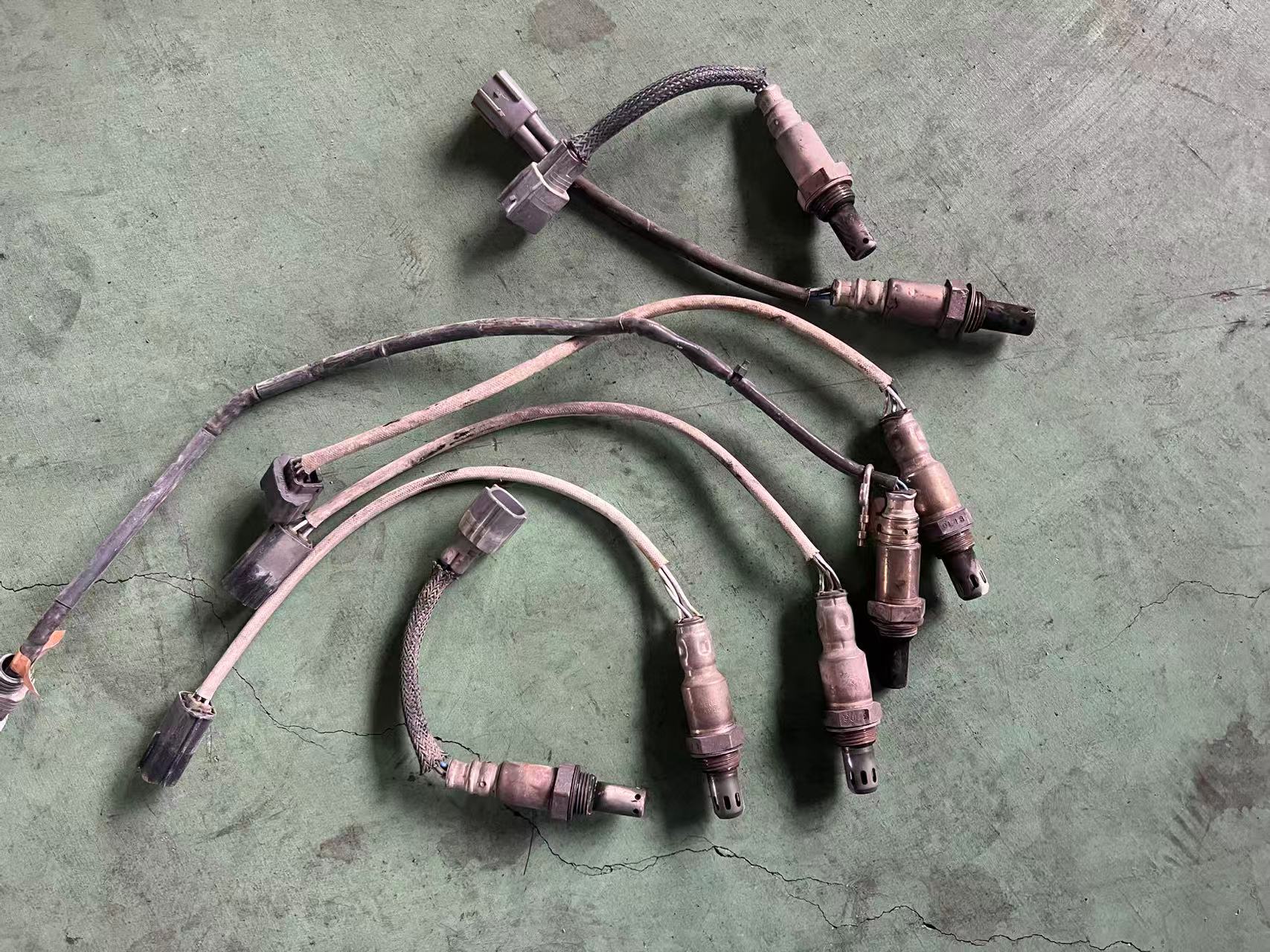 Automotive oxygen sensors with wiring and connectors